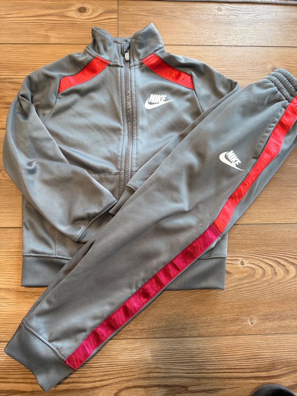 Nike kids Gray Tracksuit with Red Stripe Accents